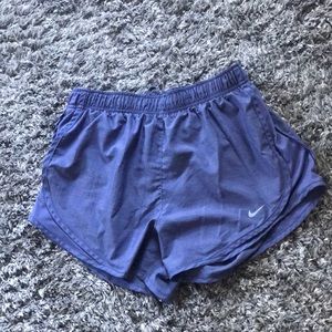 Purple Nike running shorts